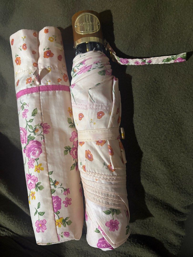 Ralph Lauren Floral Umbrella (Category: Umbrellas) located in Davao. Submitted by my_picks (Listing ID 1413616973, Image 1). Description: Authentic Ralph Lauren foldable umbrella with floral print. In good used condition and fully functional. Has been sitting unused in the closet, which is why I’m selling it. • Compact and foldable • Elegant floral design • Branded Ralph Lauren handle & sleeve •Sturdy frame, opens & closes properly • Comes with o