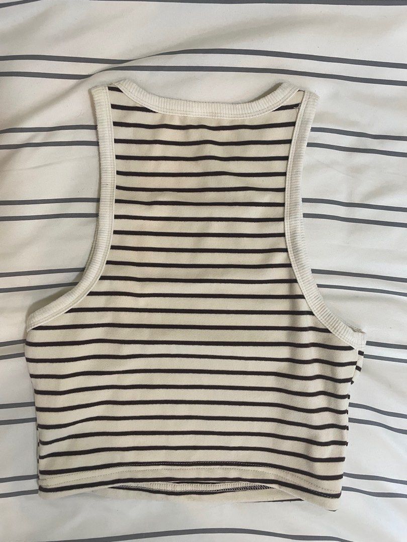 SHEIN Cream Striped Tank Top (Category: Sleeveless) located in Norzagaray. Submitted by ella.dl (Listing ID 1413625530, Image 2). Description: SHEIN Cream Striped Racerback Tank Top 🧋 ₱120 - S on tag - Worn a few times lang - Looks clean and new, i swear MOP: BPI, GCash, GoTyme MOD: Lalamove 📍 Norzagaray, Bulacan 📍 Robinsons Manila PM me lang if you have other questions! 😄 🏷️ shein, zara, h&m, uniqlo, preloved, clothes, top, wardrobe, fashio
