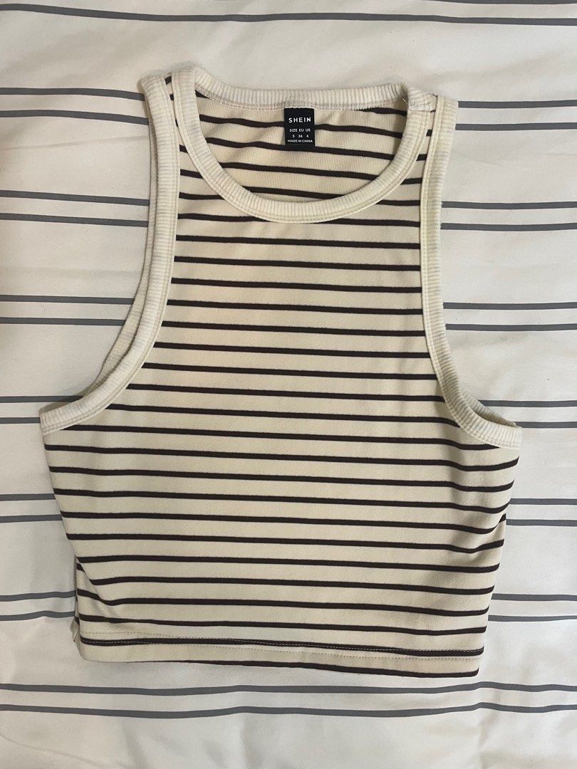 SHEIN Cream Striped Tank Top (Category: Sleeveless) located in Norzagaray. Submitted by ella.dl (Listing ID 1413625530, Image 1). Description: SHEIN Cream Striped Racerback Tank Top 🧋 ₱120 - S on tag - Worn a few times lang - Looks clean and new, i swear MOP: BPI, GCash, GoTyme MOD: Lalamove 📍 Norzagaray, Bulacan 📍 Robinsons Manila PM me lang if you have other questions! 😄 🏷️ shein, zara, h&m, uniqlo, preloved, clothes, top, wardrobe, fashio