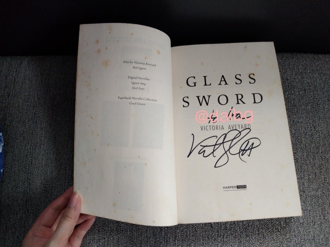 [SIGNED] Glass Sword by Victoria Aveyard (Category: Storybooks) located in Caloocan City. Submitted by daibg (Listing ID 1413460147, Image 3). Description: - 1st edition signed paperback (US) with free bookmark - Personalized with name of current owner, book was signed in-person by the author during her 2016 Manila book signing tour - Issue/s: light to medium tanning & foxing - No highlights or annotations ‼️LAST PRICE POSTED‼️ ❌️NO PAYMENT = NO 