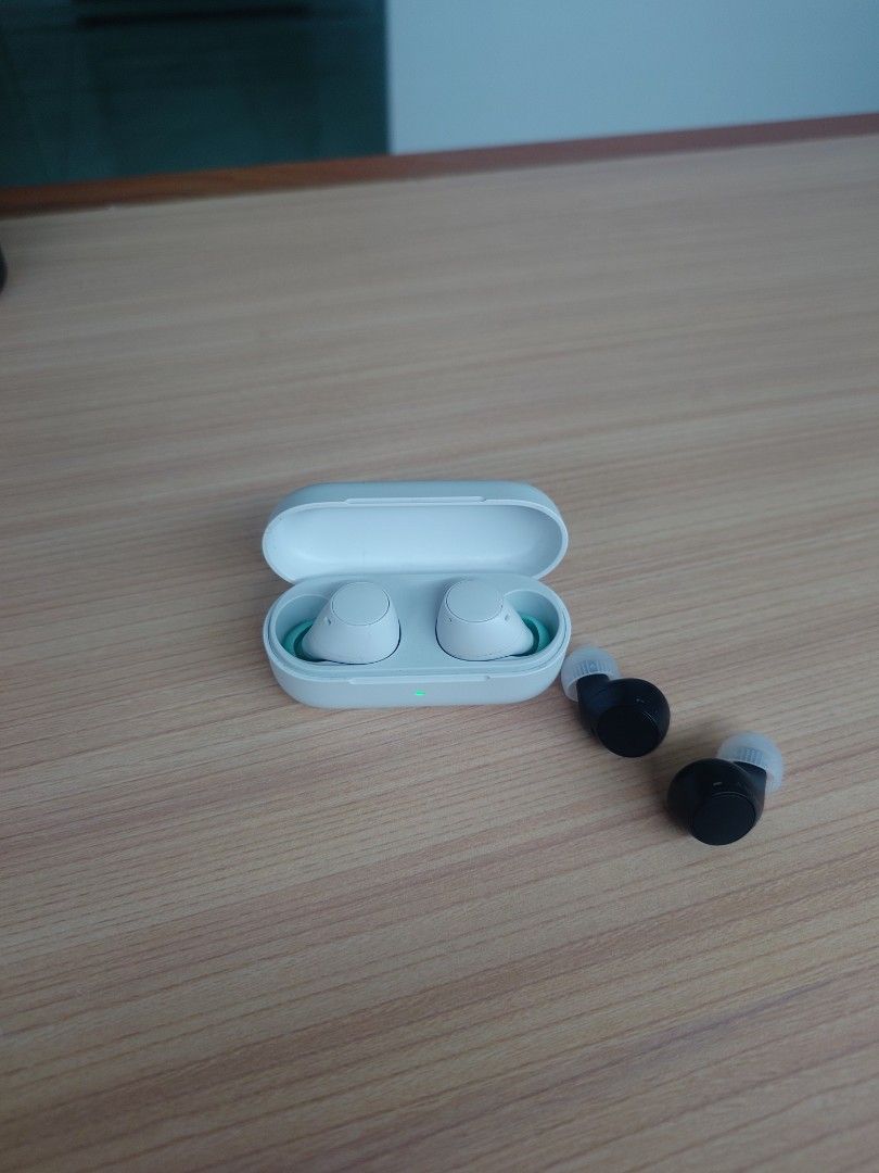 Sony WF-C510 Wireless Earbuds (Category: Earphones) located in Quezon City. Submitted by mykel776 (Listing ID 1413542648, Image 3). Description: - Sony WF-C510 Wireless Earbuds - Available Colors: Black and White - Includes Charging Case - Features: Ambient Sound Control, Equalizer Settings - Ear Tip Options Shown - Battery Level: 20%.