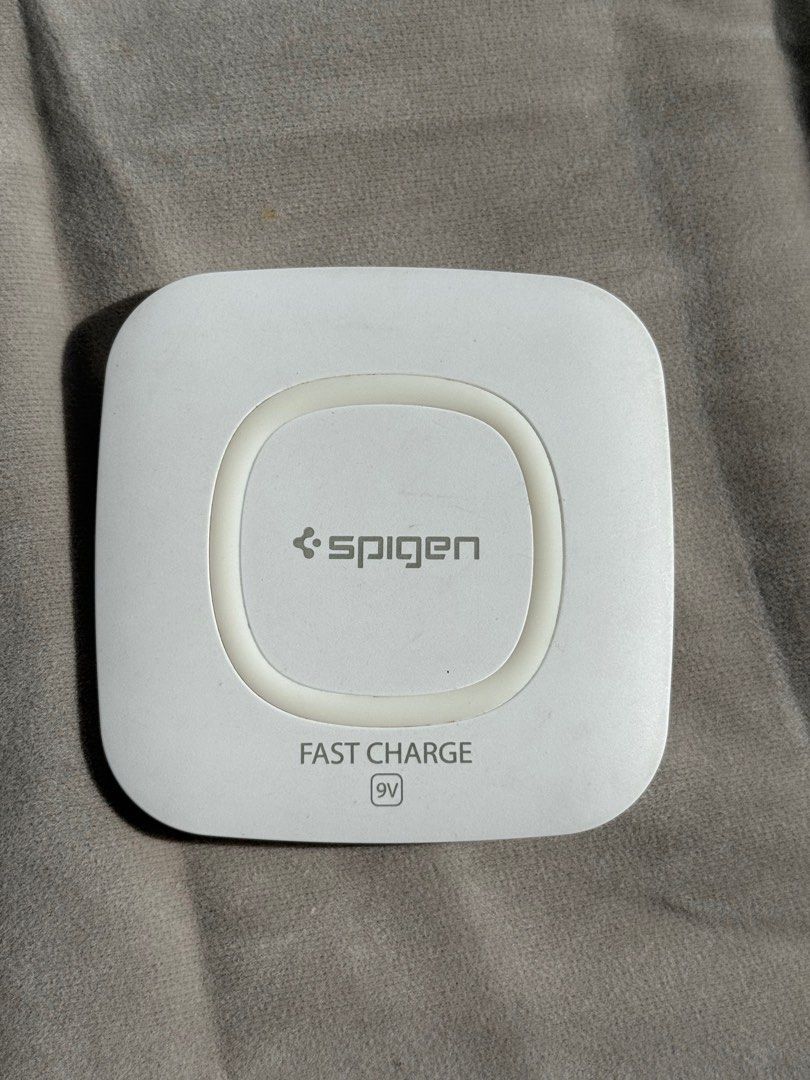 Spigen Essential Fast Wireless Charger F301W 9V (Category: Chargers) located in Manila. Submitted by doodlessss (Listing ID 1413441732, Image 1). Description: Spigen Essential Fast Wireless Charger F301W Input: 5V/2A 9V/1.8A Output: 5V/1A 9V/1A Charging distance: 5-7mm RFS: declutterring.