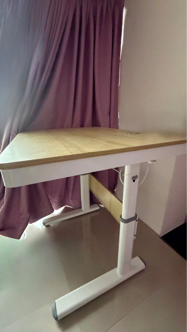 Study table/mini dinning table/make up table /computer table (Category: Tables & Sets) located in Singapore. Submitted by tassiebat (Listing ID 1413438627, Image 1). Description: Table dimension. Is 80cm by 60cm, very good quality table, can adjust and fix to your height. Not those can use for standing table. A small shelving at the front. Fast deal to open for space. Please arrange for transport, delivery is not provided..