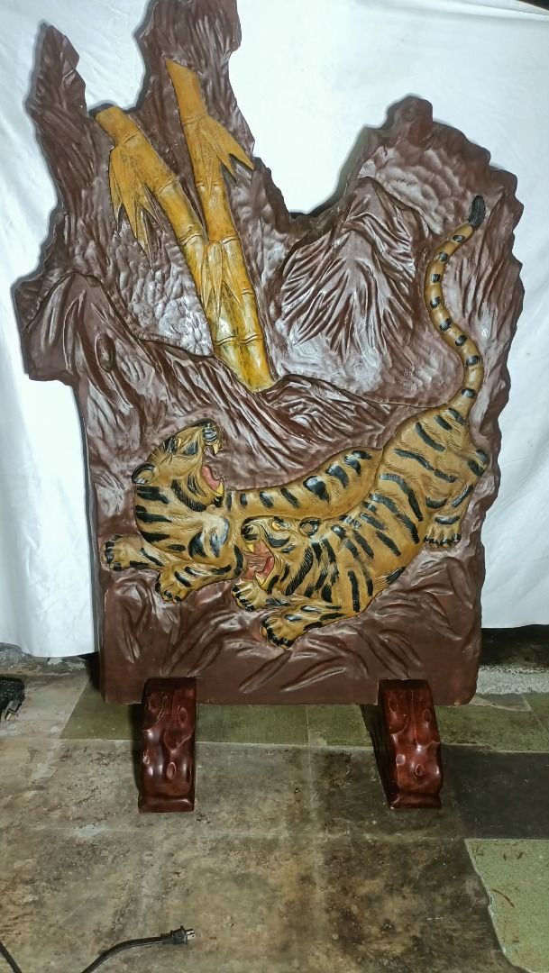 Tiger Wood Carved Divider Japan (Category: Wall Decor) located in Munoz. Submitted by larryc1212 (Listing ID 1413545521, Image 1). Description: - Wood carved with a unique design. - Features two tigers and bamboo. - Approximate dimensions: 64inches (height) x 42inches (width). Large size, more than 5 ft Item is from Japan Item may include some scratches due to age, as is were is basis Item can be pick up in our Japan surplus shop located in Munoz