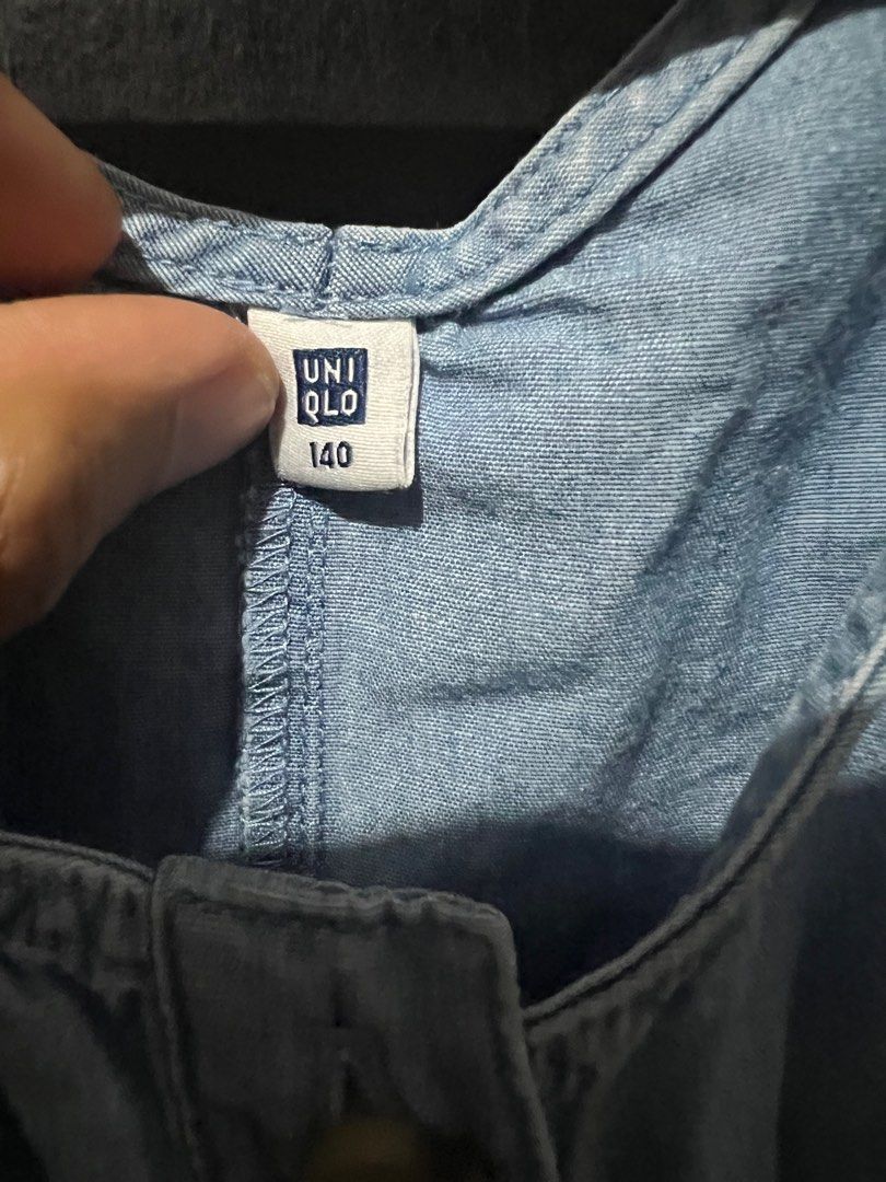 Uniqlo Denim Jumpsuit - Size 140 (Category: Babies & Kids Fashion) located in San Mateo. Submitted by junked (Listing ID 1413616997, Image 2). Description: - Uniqlo denim jumpsuit - Size: 140 - Color: Light Blue - Sleeveless design - Button-up front - Elastic waistband - Two front pockets.