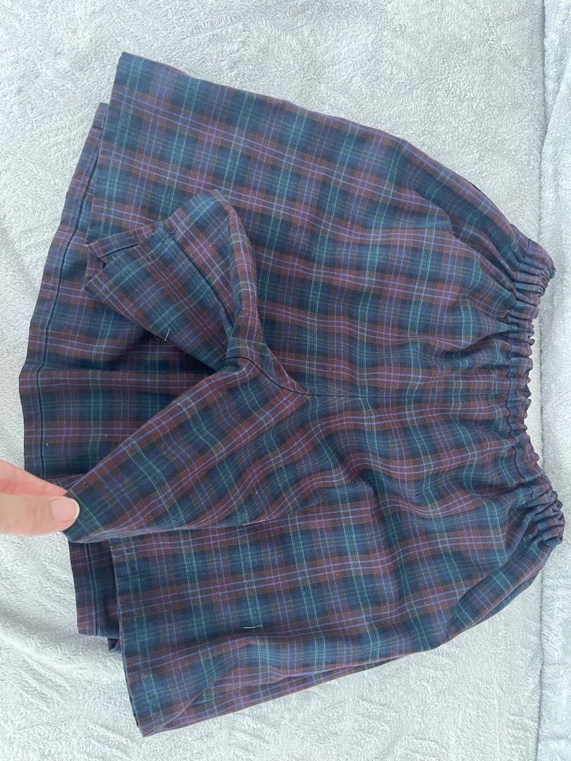 Uniqlo Plaid Shorts - Size 150 (Category: Babies & Kids Fashion) located in Quezon City. Submitted by jamieross14 (Listing ID 1413490203, Image 3). Description: - Uniqlo plaid shorts - Size: 150 - Comfortable elastic waistband - Classic plaid pattern (blue, green, brown) - Soft, woven fabric - Perfect for casual wear.