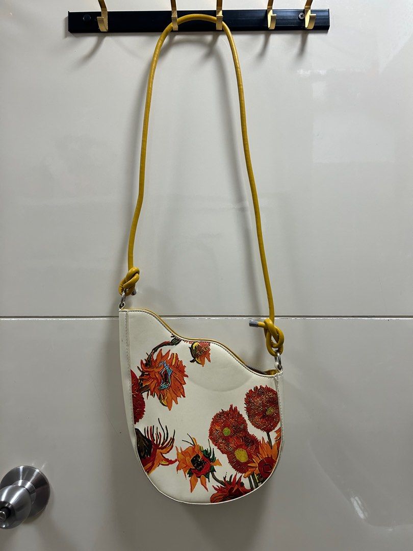 Van Gogh Sunflower Saddle Bag - Galartsy (Category: Purses & Pouches) located in Manila. Submitted by amberwardrobe (Listing ID 1413605021, Image 1). Description: Like new, please see attached photo for your reference (nbu) •original price: 2,600+ •Adjustable strap (55-110cm) length .