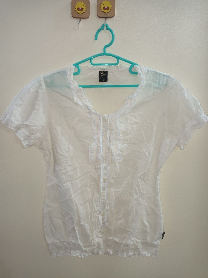 Crissa White Blouse with Ruffle Details (Category: Blouses) located in Puerto Princesa. Submitted by annn_h (Listing ID 1413615911, Image 1). Description: - White blouse - Ruffle details - Short sleeves - Button-down front - Round neckline -large on tag but best fits s to m frame.