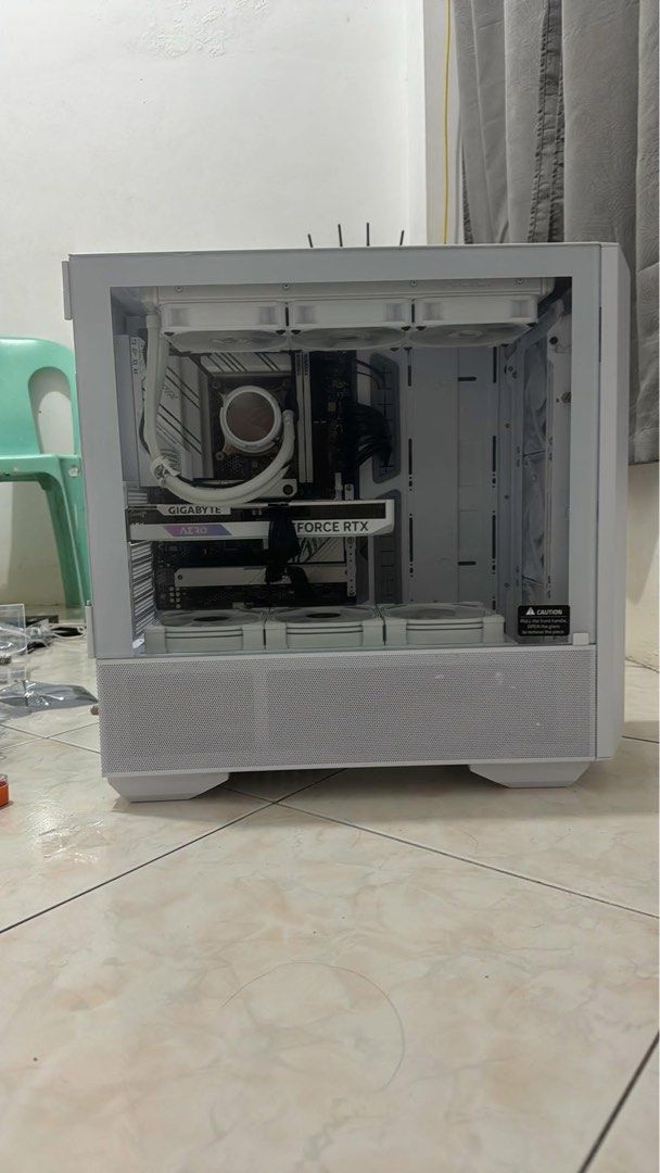 White Gaming PC with RTX 4060 (Category: Desktops) located in Davao. Submitted by kevinjames32755 (Listing ID 1413456383, Image 2). Description: Specs below: - Motherboard: ROG Strix B760-A Gaming WIFI (White) - Processor: Intel Core i9 - 14900KF (14th Gen | No Integrated Graphics) - GPU: GIGABYTE AERO GEFORCE RTX 4060 OC 8GB (White) - CPU Liquid Cooler: ROG Strix LC III 360 ARGB (White Edition) - Case: Lian Li Lancool III Tempered Glass (White) 