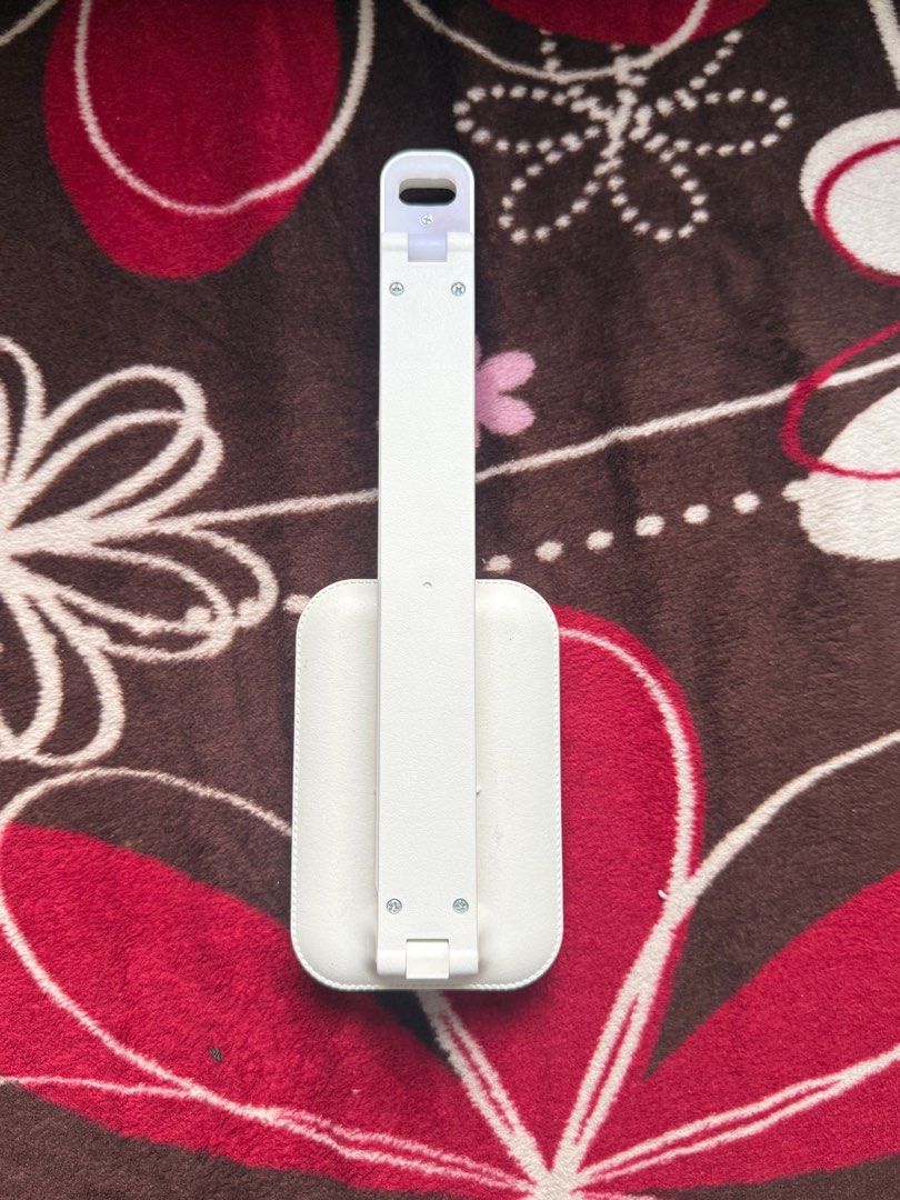 White LED Desk Lamp (Category: Lighting) located in Manila. Submitted by dendennnnnnn_ (Listing ID 1413526803, Image 3). Description: - White LED desk lamp - Ideal for studying or working - Adjustable design for optimal lighting - Features a rectangular base - Long, slender light panel - In good working condition - With charging cord.
