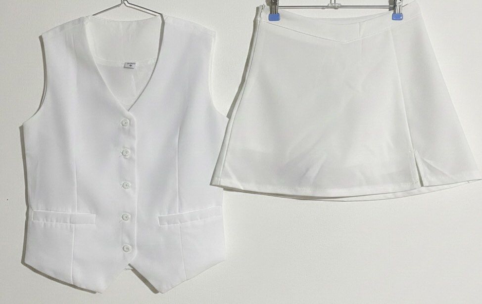 White Vest | White Skirt (Category: Sleeveless) located in Valenzuela. Submitted by nikizef_ (Listing ID 1413634495, Image 1). Description: Used Once Vest Size: M on tag can fit Small to Med – 250 Skirt Size: Small – 200 Vest with Skirt – 400 RFS: Decluttering.