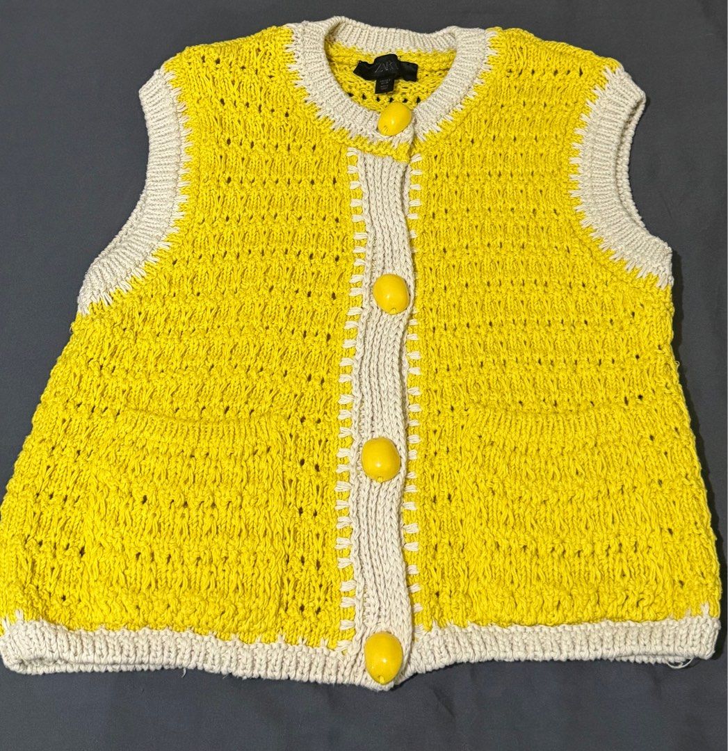 Zara Oversized Button Knitted Waistcoat Top Yellow (Category: Sleeveless) located in Makati City. Submitted by loriz_mar (Listing ID 1413565213, Image 3). Description: Zara knit vest in vibrant yellow with cream trim. Size S. Button-up front, round neckline, and sleeveless. Relaxed fit, perfect for layering..