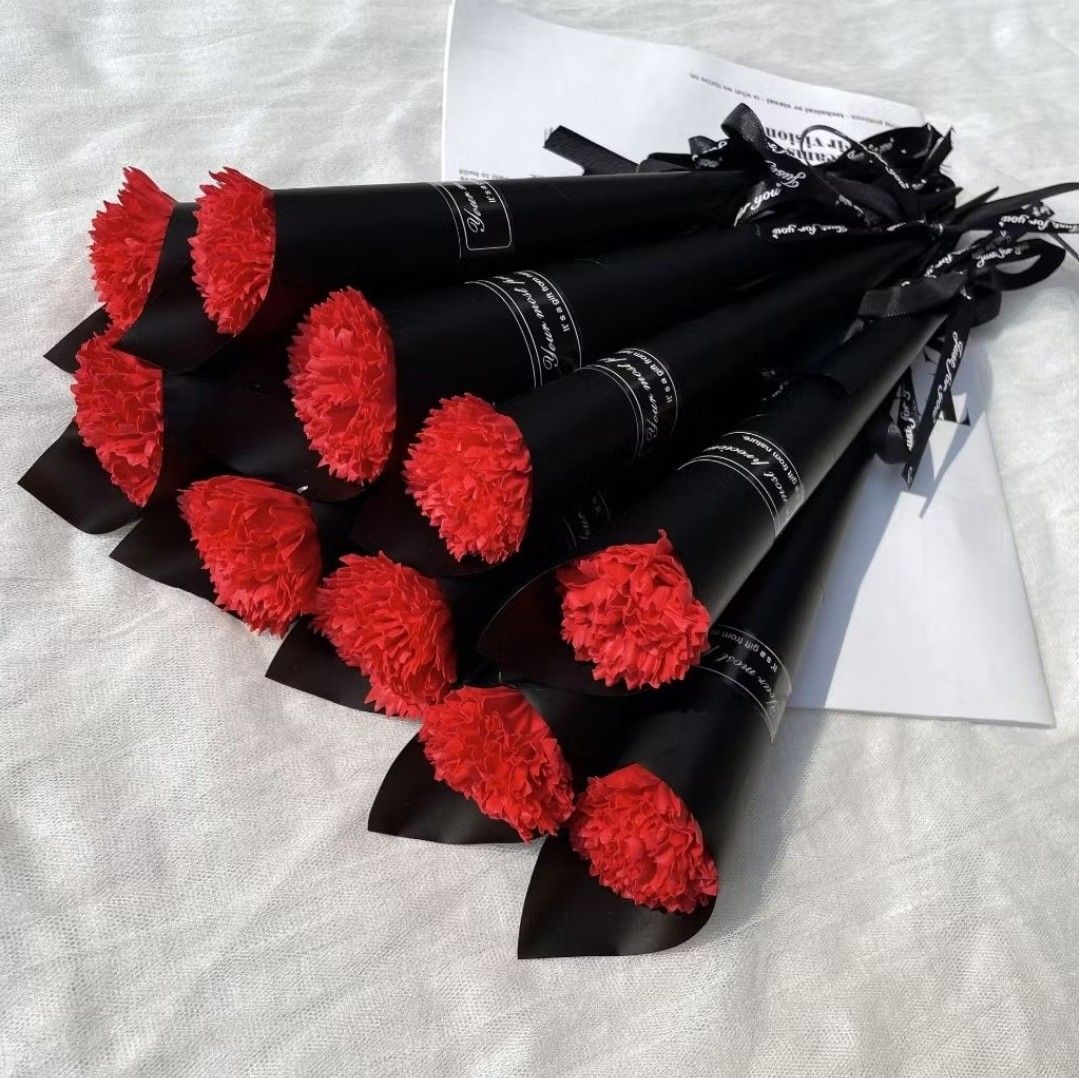 5/10/20pcs Red Carnation Bouquet (Category: Flowers & Bouquets) located in Mandaluyong City. Submitted by goodthriftfinds67 (Listing ID 1413654165, Image 1). Description: - Red carnation bouquet - Wrapped in black paper cones - Tied with a ribbon - Great for gifting - Adds color to any space.