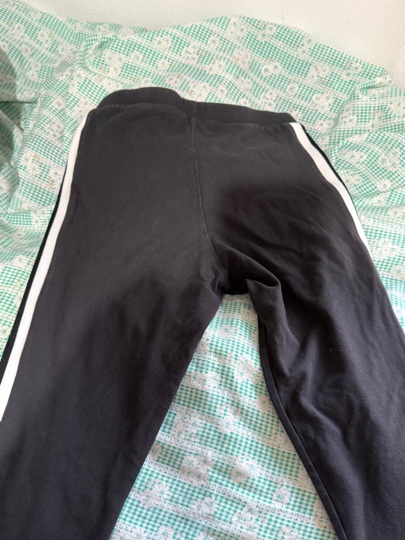 Adidas Trefoil Leggings (Category: Activewear) located in Malabon City. Submitted by decluttergyal (Listing ID 1412126452, Image 3). Description: - Adidas leggings - Black with white stripes - Adidas logo detail - Stretchy material - Classic three-stripe design - Mid-waist - Lightly used but no flaws or issues at all, it’s just that I’ve used it multiple times..
