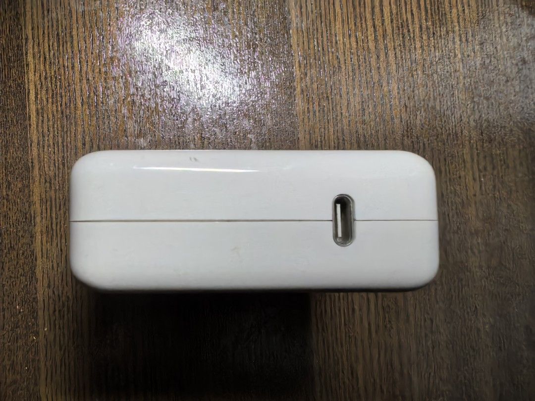 Apple 61W USB-C Power Adapter (Category: Chargers & Cables) located in Manila. Submitted by boccy2023 (Listing ID 1413819061, Image 2). Description: Fixed rate. Genuine Apple 61W USB-C Power Adapter. Features a USB-C port for charging. Authentic. Self used. No cable. .