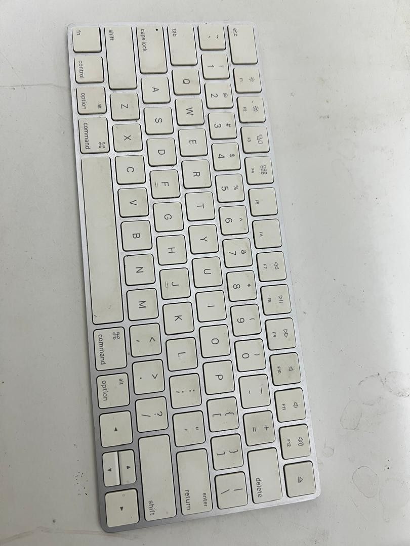 Apple Magic Keyboard (Category: Computer Keyboard) located in Kuala Lumpur. Submitted by freerabbit-cc1523 (Listing ID 1413809607, Image 1). Description: - Apple Magic Keyboard for Mac - Silver finish with white keys - Standard layout with number pad - Designed for Mac computers.