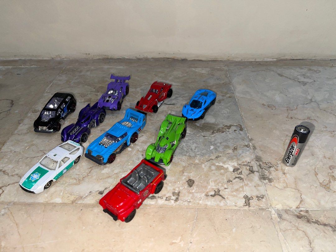 Assorted Toy Cars Collection plastic diecast (Category: Vehicle & Diecast Models) located in Pasay City. Submitted by j_wolf (Listing ID 1413759448, Image 2). Description: - Assorted toy car collection - Includes emergency vehicles, race cars, and novelty designs - Variety of colors and styles - Features a toy astronaut figure - Includes a space shuttle car - Detailed graphics on some cars - Great for collectors and kids 260 per set.
