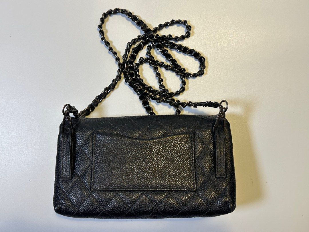 Chanel mini caviar bag (Category: Luxury Bags & Wallets) located in Caloocan City. Submitted by greenboxpackaging (Listing ID 1413852293, Image 3). Description: Chanel Uniform Caviar belt bag turns into a sling bag. Belt not included. Posted a photo when worn. Open for offers no lowballers please. Thank you.