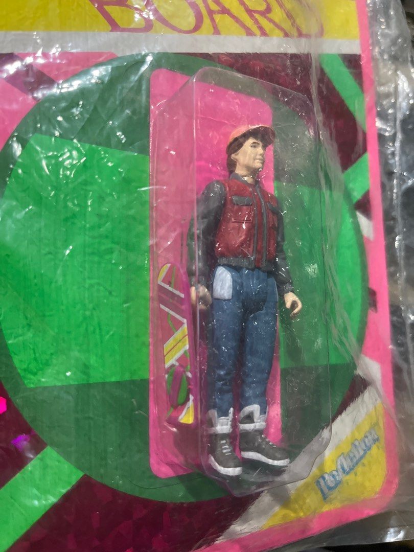 Back to the Future II Hover Board Figure Marty Mcfly (Category: Action & Battle Toys) located in Bacoor. Submitted by illbimbo (Listing ID 1413679423, Image 2). Description: This is a Super7 2020 SDCC exclusive Back to the Future Part II ReAction Figure of Marty McFly with a hoverboard. The figure is part of the ReAction Figures line, designed in the iconic 3¾-inch retro action figure style. It was released as a San Diego Comic-Con (SDCC) exclusi