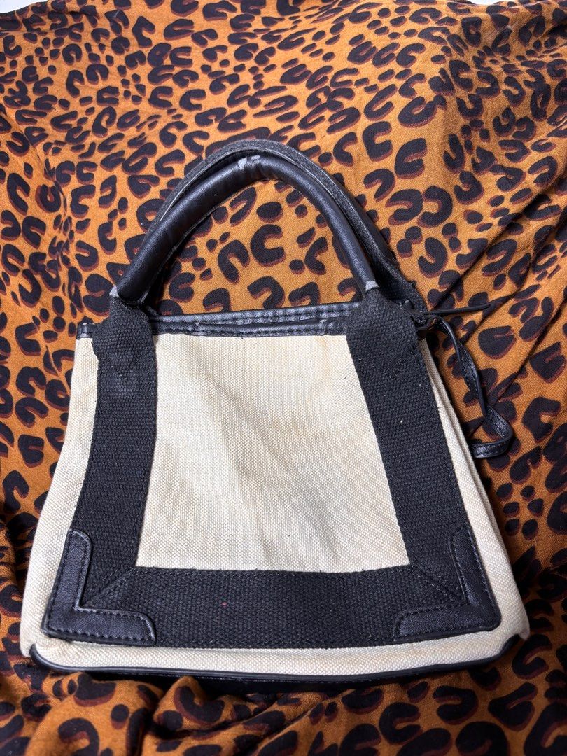 Balenciaga Cabas Leather Bag (Category: Luxury Bags & Wallets) located in Manila. Submitted by earlylifecrisis3 (Listing ID 1413667421, Image 2). Description: Condition 9/10 Measure it by inch Width: 9.5 Length: 8.5 Depth: 2.5 •Refund / Returns not allowed allowed •Please do check the dimensions size on labels sometimes are not accurate on the sizing •Ask me before purchasing.
