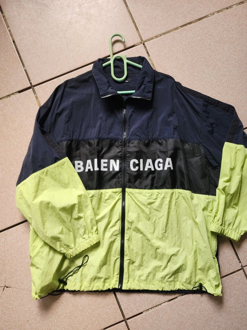 Balenciaga Windbreaker Colorblock Jacket (Category: Coats, Jackets and Outerwear) located in Dumaguete. Submitted by xxjka13 (Listing ID 1413705554, Image 1). Description: - Thrifted - The drawstring garter in the bottom needs to be replaced, but can still be used - Print is still solid - Negotiable price! - Oversized fit (L-XL).