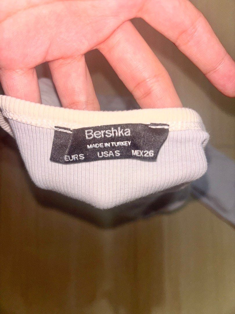Bershka Blue Cropped Longsleeves (Category: Longsleeves) located in Muntinlupa City. Submitted by ldt30__ (Listing ID 1413745104, Image 3). Description: - s-m - bought in bershka glorietta - has minor stain in the middle printed part loc: paranaque or taft.