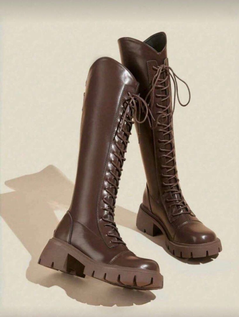 Brown Knee High Lace Up Boots chunky (Category: Boots) located in Bacoor. Submitted by everything_etc. (Listing ID 1413695643, Image 1). Description: - Brown leather knee-high boots - Lace-up design - Chunky heel - Back zipper for easy wear - Round toe - Sturdy sole - Suitable for various occasions Used once.