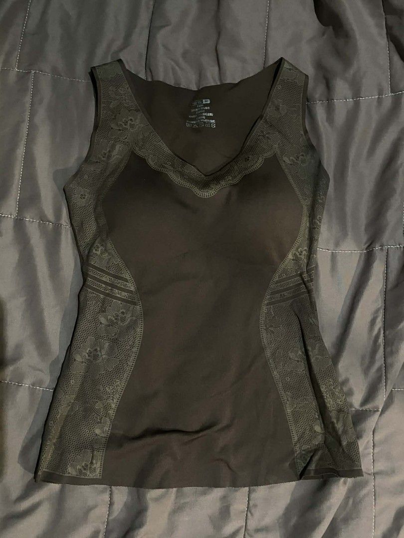 Brown Lace Trim Tank Top (Category: Sleeveless) located in Rizal. Submitted by jdn0928 (Listing ID 1413799538, Image 1). Description: Brown tank top with lace trim detailing. Features a V-neck design and a fitted silhouette. The tank top has a built-in bra. Perfect for layering or wearing on its own..