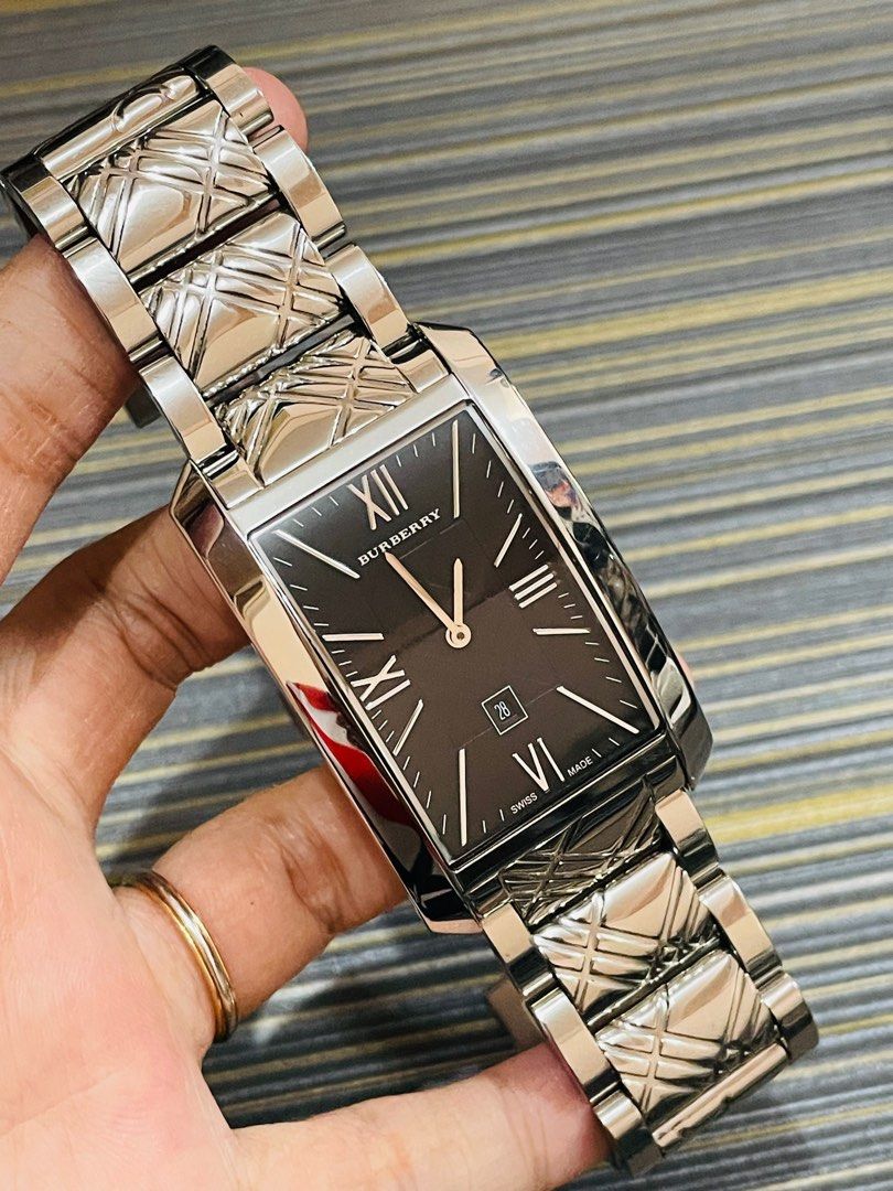 Burberry Tank BU1097 Big Size (Category: Luxury Watches) located in Paranaque City. Submitted by kjoyyy (Listing ID 1413734702, Image 2). Description: Burberry Tank BU1097 Swiss Quartz Movement 30x48mm case size Fit up to 6.5 inches wrist size only no extra Good running condition Preloved Used Watch Authentic/Original Watch only!! with provided box ordinary.
