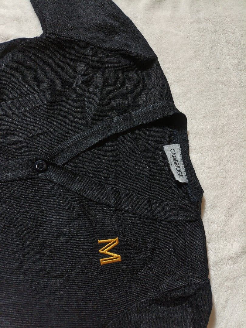 Cambridge Black Cardigan with 'M' Logo (Category: Coats, Jackets and Outerwear) located in Manila. Submitted by hulyaaa123 (Listing ID 1413773381, Image 1). Description: - kulang Ng Isang butones, good quality. XS - Small Ang size..