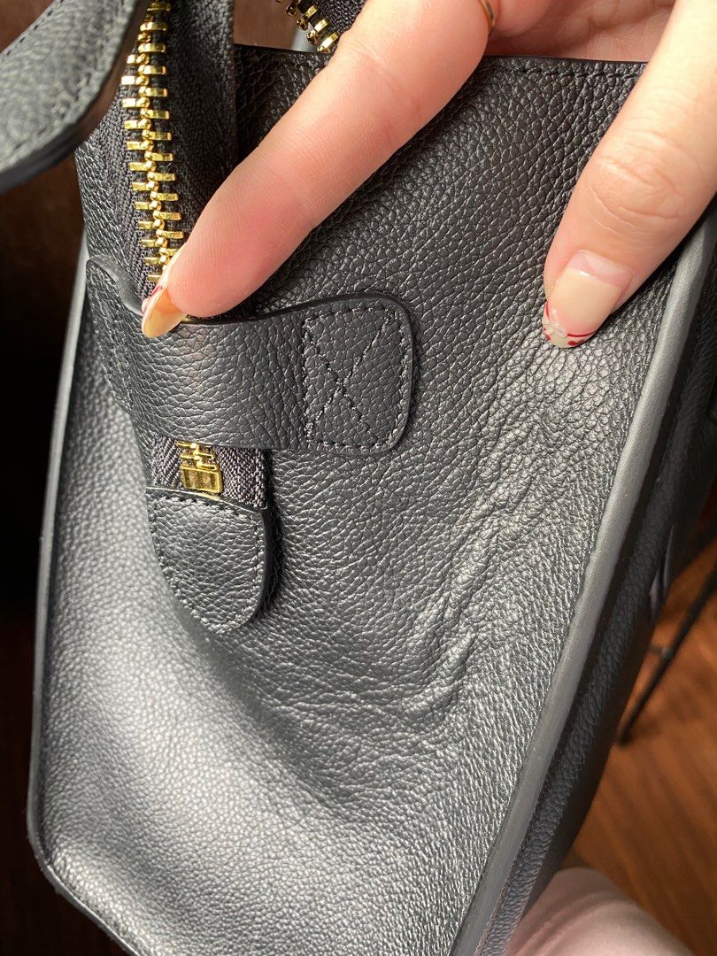 Celine Luggage Nano Handbag Black (Category: Luxury Bags & Wallets) located in Nagcarlan. Submitted by zshopperz.199x (Listing ID 1413687532, Image 2). Description: - Celine Luggage Nano handbag - Color: Black - Design: Top handle - Closure: Zip closure - Exterior: Front zip pocket - Hardware: Gold-toned - Material: Leather - Celine logo on front ALL MY ITEM MUST SALE PAMIGAY SALE ‼️ As is na po message nalang po para sa mga minimal damage natamb
