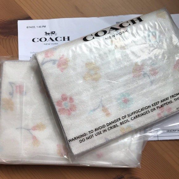 Coach Floral Passport Holder (Category: Wallets & Card holders) located in Cebu City. Submitted by sixfiftyfour (Listing ID 1413703732, Image 3). Description: - Brand new Coach passport holder - Features a beautiful floral design - Includes multiple card slots - Has a dedicated passport compartment - Made with high-quality materials - Interior color: Light brown - Comes with original tags - Ideal for travel.
