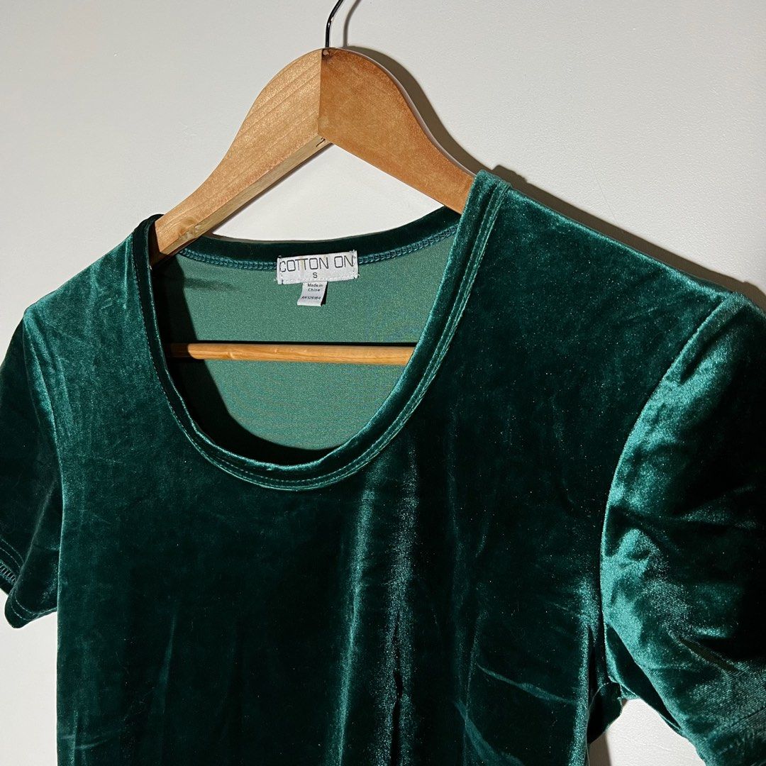 Cotton On Dark Green Velvet Top (Category: Shirts) located in Paranaque City. Submitted by shopdeclutterfly (Listing ID 1413834708, Image 2). Description: BRAND: Cotton On BEST FITS: XS-M Message me for more information. Important Notes: — Color may vary slightly due to lighting and screen settings. — This is a preloved item. — Minor signs of wear may be present — There may be small stains, dots, or marks due to storage and previous use. — Please