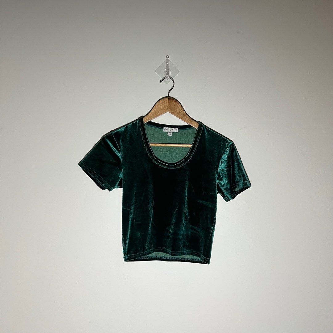 Cotton On Dark Green Velvet Top (Category: Shirts) located in Paranaque City. Submitted by shopdeclutterfly (Listing ID 1413834708, Image 1). Description: BRAND: Cotton On BEST FITS: XS-M Message me for more information. Important Notes: — Color may vary slightly due to lighting and screen settings. — This is a preloved item. — Minor signs of wear may be present — There may be small stains, dots, or marks due to storage and previous use. — Please