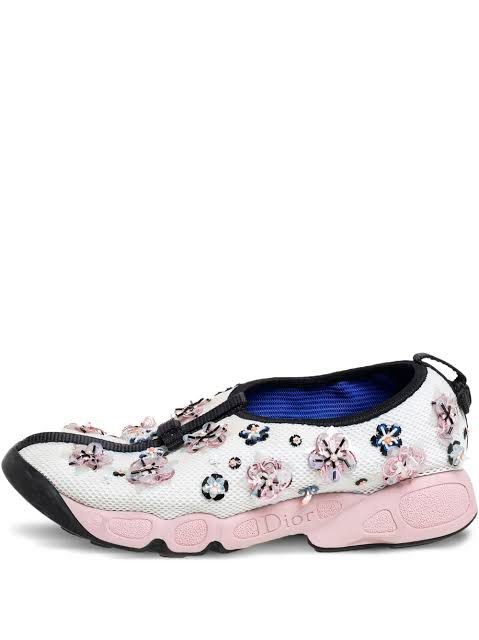 Dior Floral Embellished Sneakers (Category: Sneakers) located in Paranaque City. Submitted by MigsPPP (Listing ID 1413737476, Image 2). Description: - Dior sneakers with floral embellishments - Slip-on design with mesh upper - Pink sole featuring the Dior logo - Black trim - Blue inner lining - Stylish and comfortable.