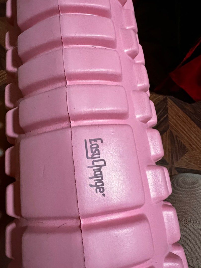 Easy Change Pink Foam Roller (Category: Toning & Stretching Accessories) located in Quezon City. Submitted by daday39 (Listing ID 1413683832, Image 1). Description: - Easy Change pink foam roller - Designed for muscle recovery and self-massage - Textured surface for targeted pressure - Ideal for pre- and post-workout routines - Features a black core and pink exterior - Compact size for easy storage and transport.