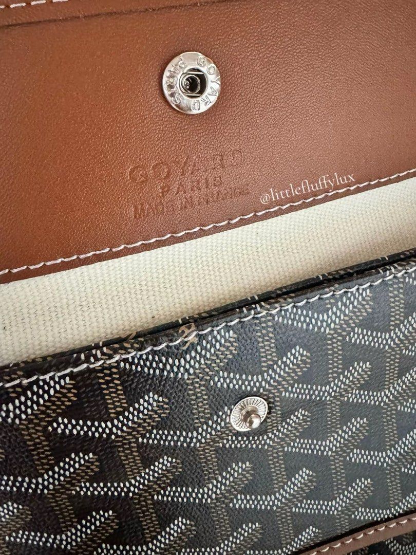 Goyard Hobo Bag (Category: Luxury Bags & Wallets) located in Pasig City. Submitted by littlefluffylux (Listing ID 1413753754, Image 3). Description: - Black and Tan color (two tone) - Classic Goyardine pattern - Brown leather trim and strap - Detachable pouch included - Interior features snap closure - Goyard Paris Made in France stamp - Comes with dust bag .