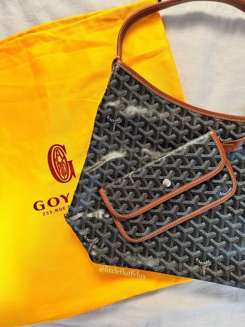 Goyard Hobo Bag (Category: Luxury Bags & Wallets) located in Pasig City. Submitted by littlefluffylux (Listing ID 1413753754, Image 1). Description: - Black and Tan color (two tone) - Classic Goyardine pattern - Brown leather trim and strap - Detachable pouch included - Interior features snap closure - Goyard Paris Made in France stamp - Comes with dust bag .