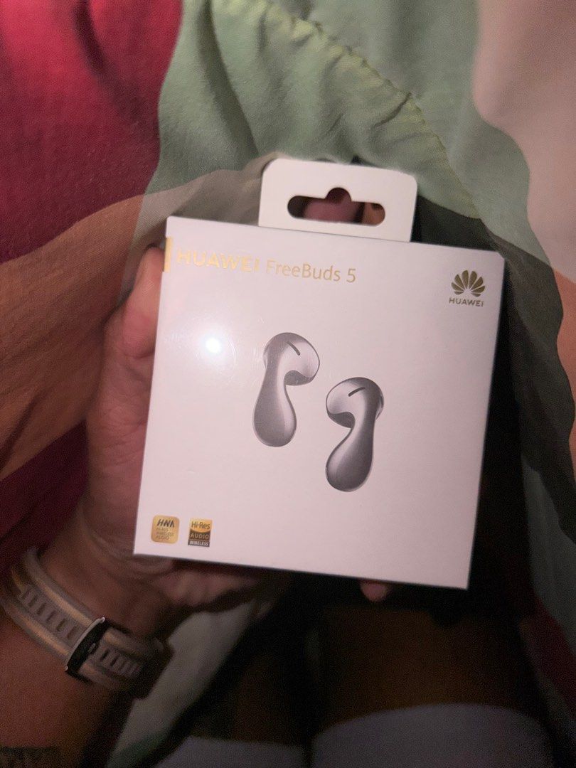 Huawei FreeBuds 5 - black (Category: Earphones) located in Angono. Submitted by blackbeard24 (Listing ID 1413833900, Image 2). Description: - Huawei FreeBuds 5 (Silver) - Punchy Bass - Triple Adaptive EQ - Comfortable, Seamless Design - 30 Hours Playback with Super Charging - Open-fit ANC - Includes Earbuds and Charging Case SRP 7000+.