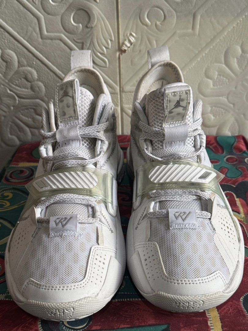 Jordan Why Not Zer0.2 White (Category: Babies & Kids Fashion) located in Baguio. Submitted by ezaussie (Listing ID 1413699431, Image 2). Description: - White Jordan Why Not Zer0.2 sneakers - White upper - Midfoot strap - Jordan logo on tongue - Unique heel design - Signs of wear on soles and uppers - White laces.