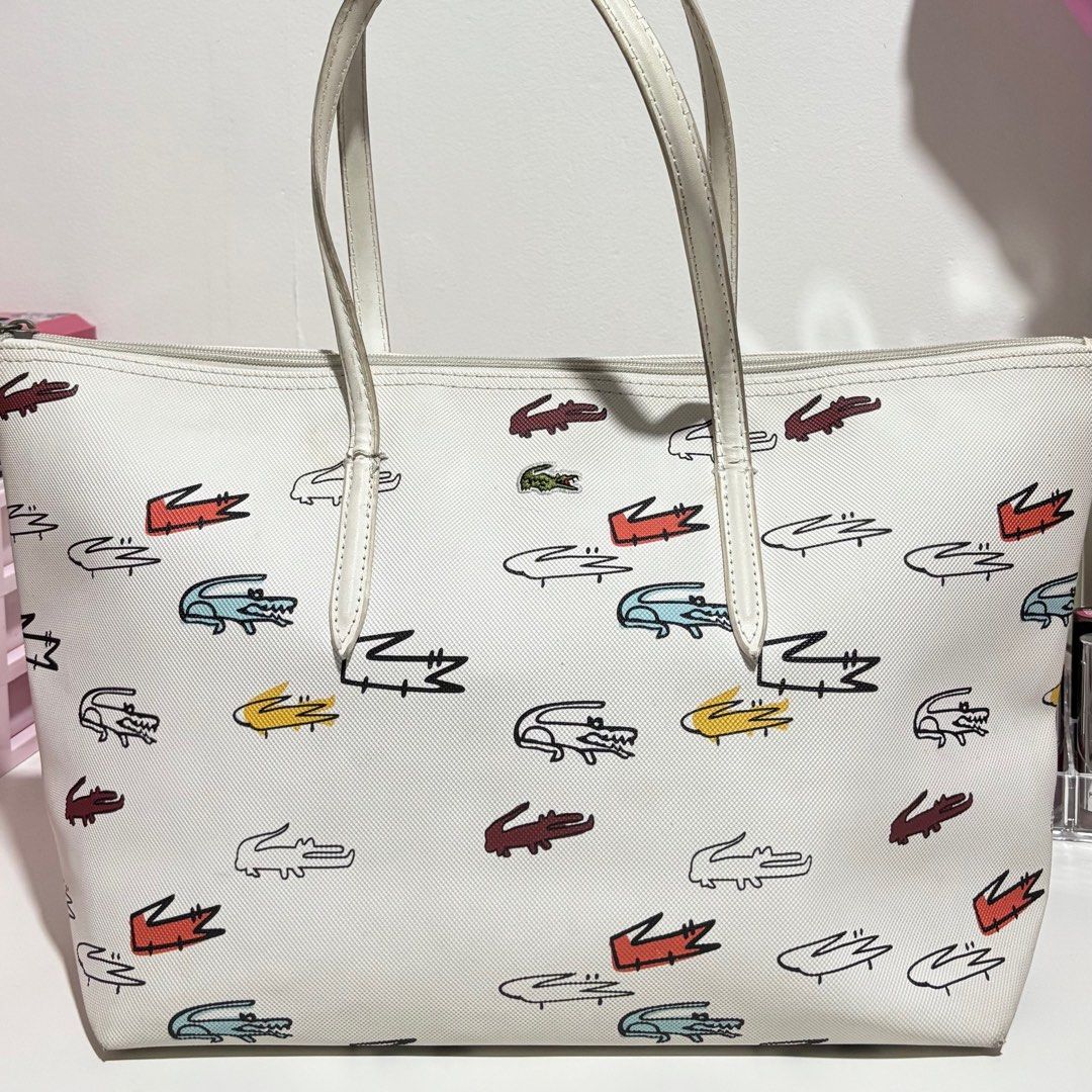 Lacoste Tote Bag (Category: Tote Bags) located in Quezon City. Submitted by declutterwithmissa (Listing ID 1413803367, Image 1). Description: 📍Location: Quezon City.