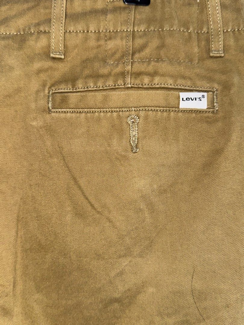 Levi's Chino Pants (Category: Chinos) located in Baguio. Submitted by ezaussie (Listing ID 1413699430, Image 3). Description: - Levi's khaki chino pants - Metal zipper fly - Reinforced pocket bags - White tab - Two back pockets - Levi's logo on back pocket - Model number: 18483.