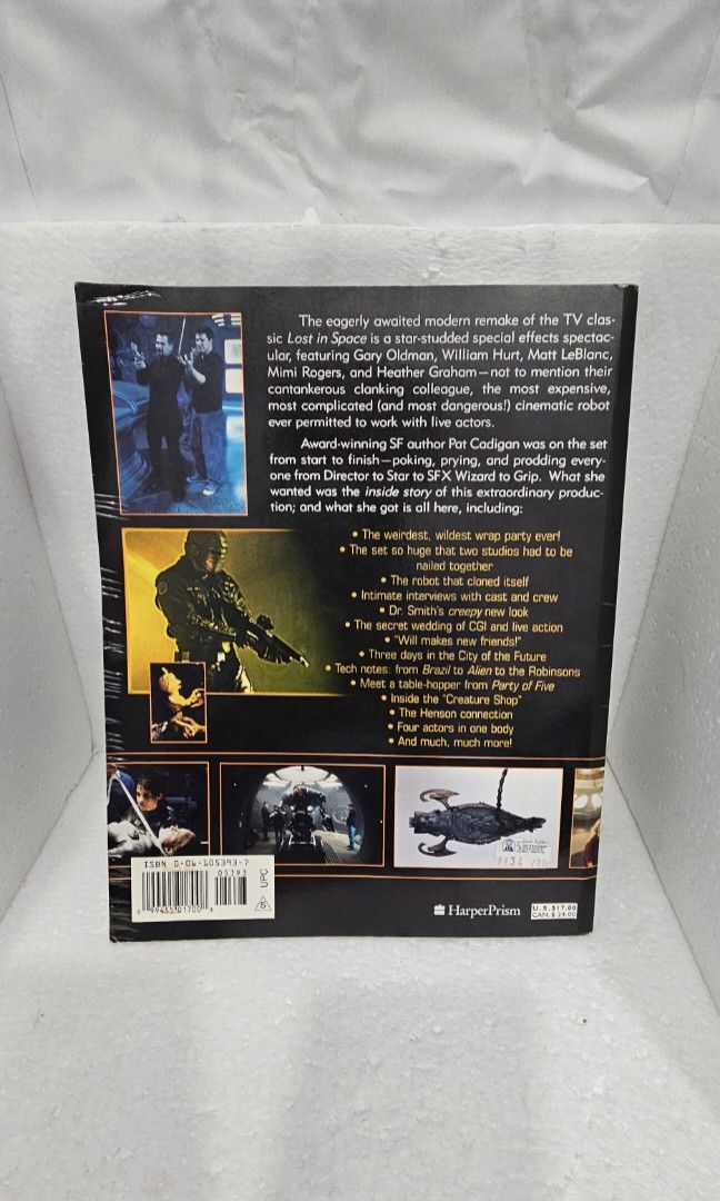 Lost in Space: The Making Of (Category: Storybooks) located in Baguio. Submitted by bitsbaguio (Listing ID 1413750452, Image 2). Description: - Paper back Book, "The Making Of Lost in Space," delves into the spectacular special effects and star-studded cast of the iconic film. It offers a behind-the-scenes look at the cinema history. Written by Pat Cadigan. - Very good condition. All pages intact. -Very good for movie memorabilia collectors and m