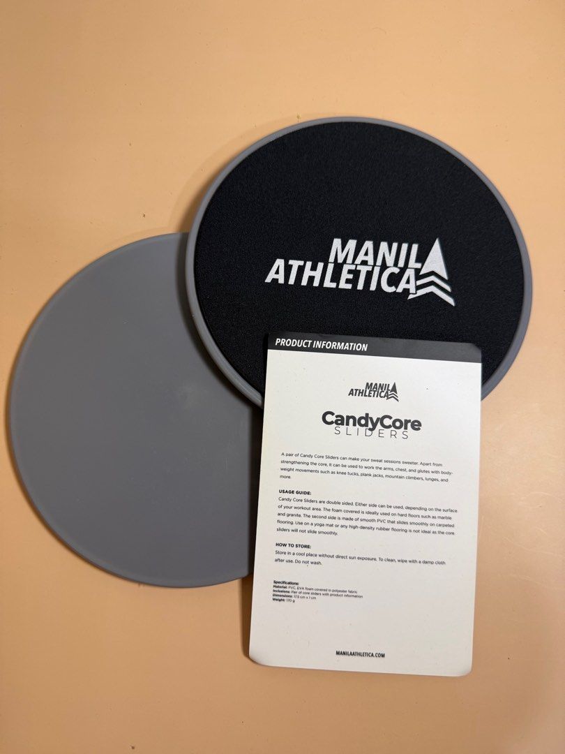 Manila Athletica CandyCore Sliders (Category: Cardio & Fitness Machines) located in Pasig City. Submitted by chikaching (Listing ID 1413759480, Image 1). Description: - CandyCore Sliders by Manila Athletica - Designed to enhance your workouts - Works arms, chest, and glutes - Use for bodyweight exercises like knee tucks, plank jacks, and lunges - Foam side for hard floors - Smooth PVC side for carpets.
