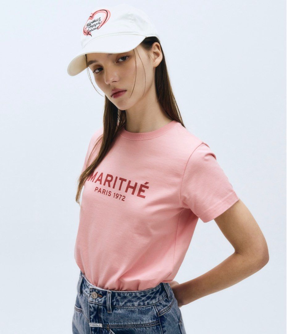 Marithe w regular logo tee (Category: Shirts) located in Singapore. Submitted by adlvclothing (Listing ID 1413753552, Image 2). Description: Authentic from Korea Size M only. White / Pink / Blue PTP: 48CM, LENGTH 56CM.