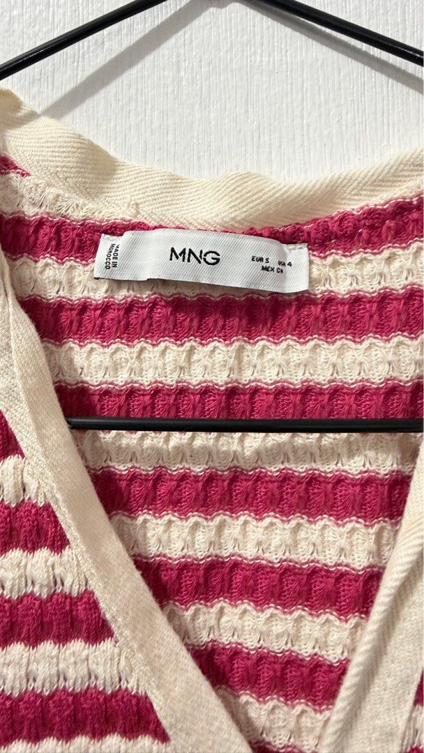 MNG Striped Midi Dress (Category: Dresses) located in Manila. Submitted by narshmallow (Listing ID 1413773819, Image 2). Description: - MNG midi dress - Size: S - Pattern: Pink and white stripes - Neckline: V-neck - Design: Button-down front - Sleeves: Short-sleeved - Fabric: Textured.