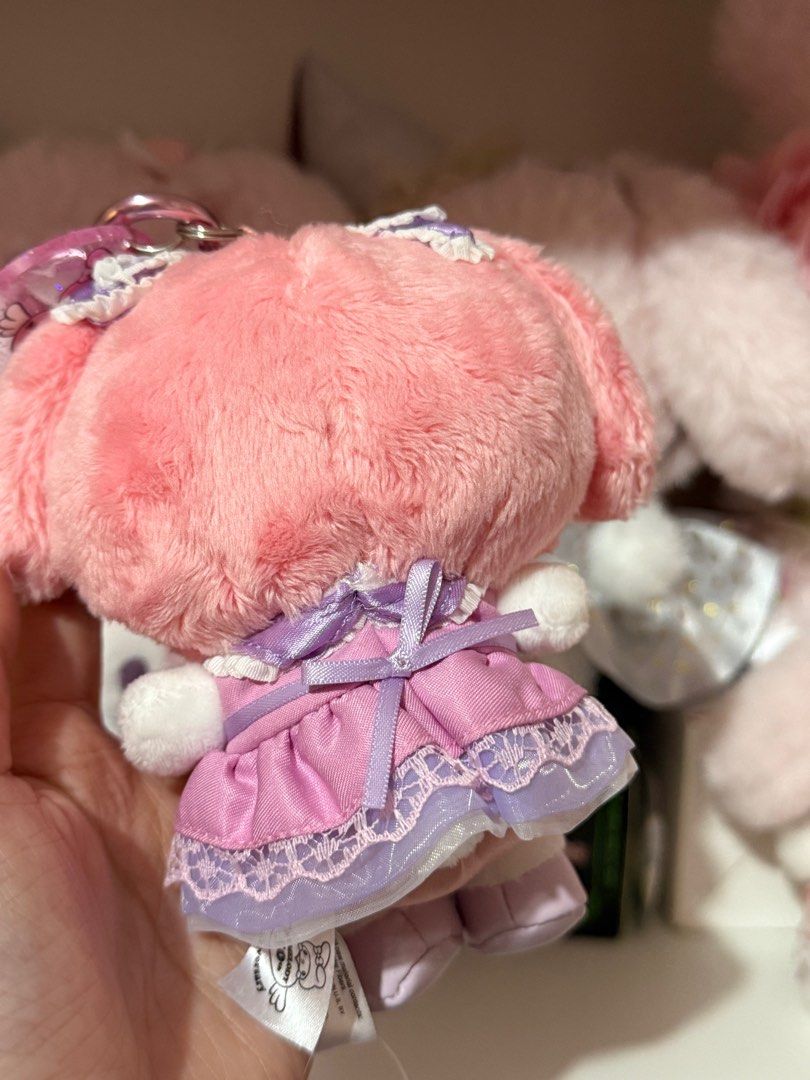 My Melody 50th Anniversary Plush Charm (Category: Character Goods) located in Bocaue. Submitted by yncheoli (Listing ID 1413668866, Image 2). Description: - My Melody 50th Anniversary Plush Keychain - Features My Melody in a pink and purple dress. - Includes keychain attachment. - Clear tag with anniversary logo. - Original tag still attached. - Cute and collectible!.