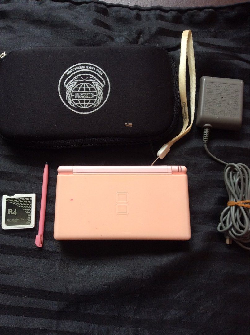 Nintendo DS Lite (Category: Nintendo) located in Quezon City. Submitted by marky1969 (Listing ID 1413700545, Image 1). Description: For Sale Only! Tested 100% Working.. R4 with 1gb mc full of game Original Charger 110 Volts Case No Warranty ( Test all you want lang ) WYSIWYG... Actual Pic Posted... Pick up lang dito sa house along T Sora QC for testing or shipping... Thks!.