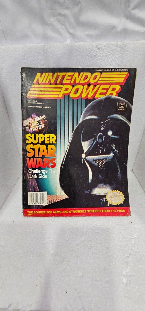 Nintendo Power Magazine Super Star Wars (Category: Comics & Manga) located in Baguio. Submitted by bitsbaguio (Listing ID 1413733832, Image 1). Description: Rare Vintage Nintendo Power magazine featuring Super Star Wars. The cover showcases Darth Vader. The magazine includes strategies and hints. It is a collectible item for fans of the game and Nintendo Power. Note- Subscription card is cut off. Nonetheless, all pages is intact..