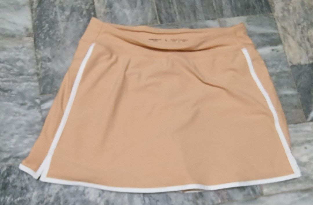 Old Navy Active Skirt - Size L (Category: Skirts) located in Manila. Submitted by Prea_G (Listing ID 1413754486, Image 3). Description: -Old Navy Active skirt in peach with white trim. -Size Large. -Built-in short. -Perfect for sports. - Comfortable and breathable..